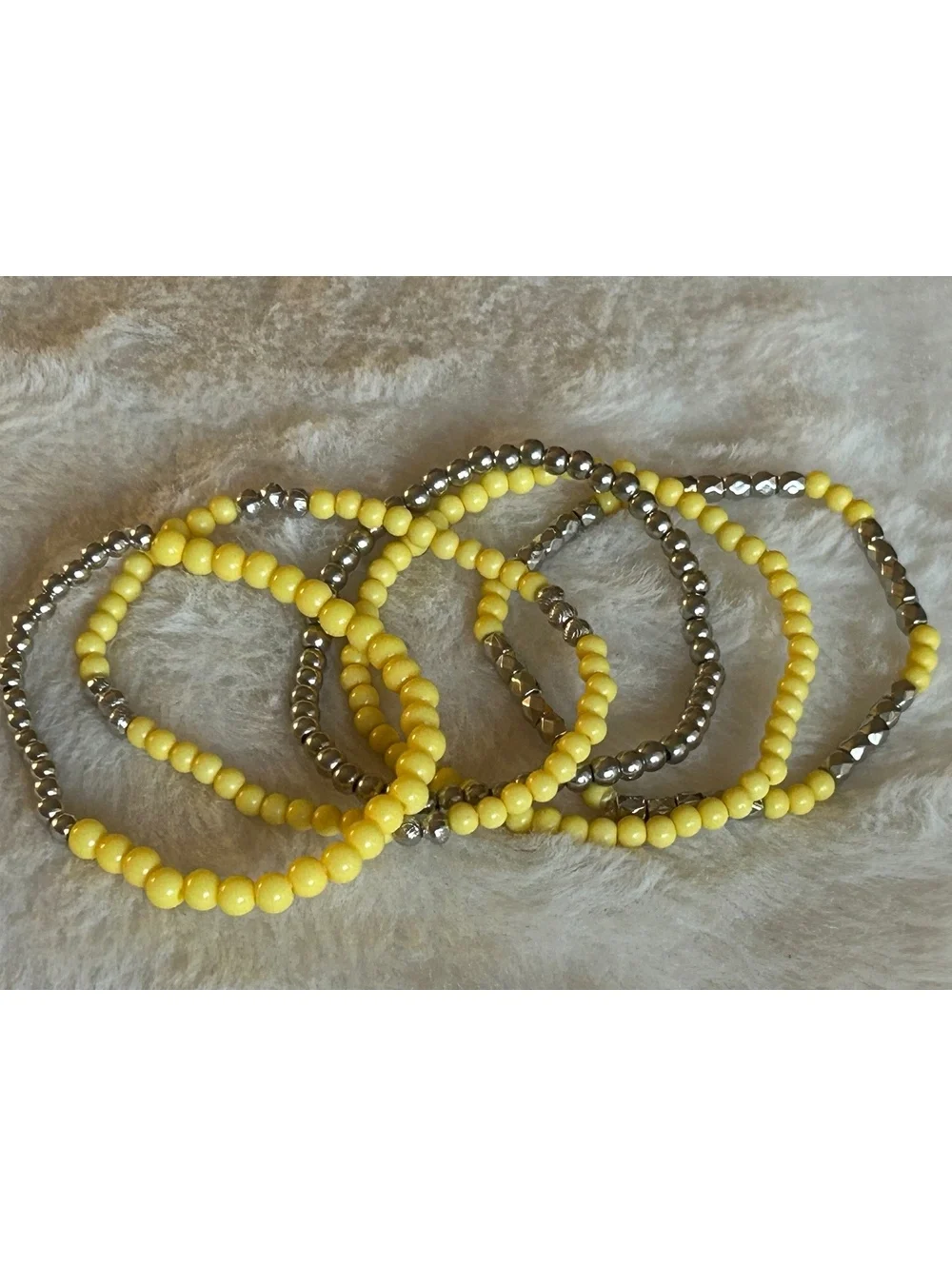 Set of Yellow and Silver Beaded Stretch Bracelets